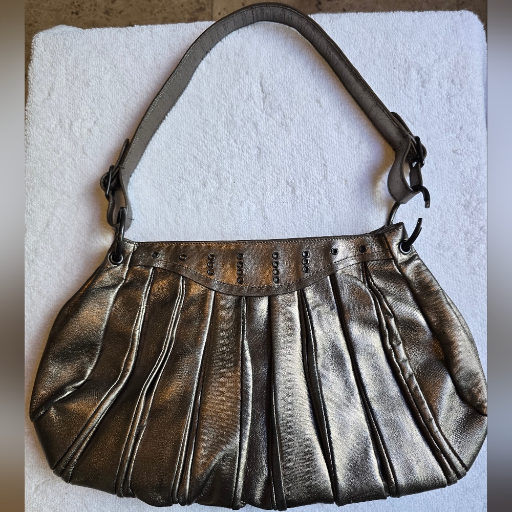 Vintage Bottega Veneta metallic leather purse with suede lining